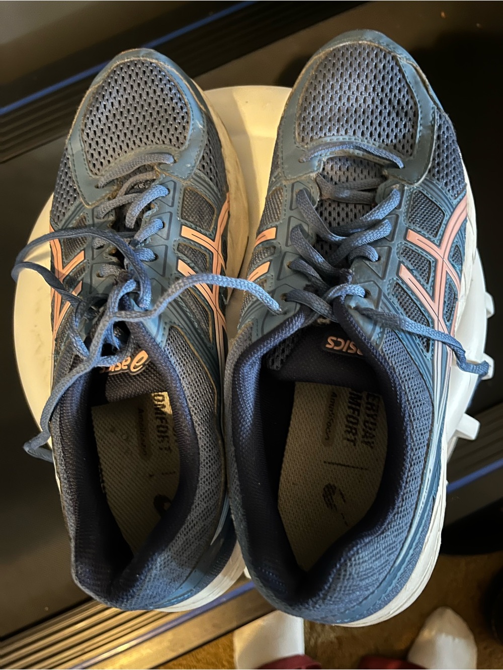 ASICS women’s Blue Running Shoes with Pink Accents. Size 9